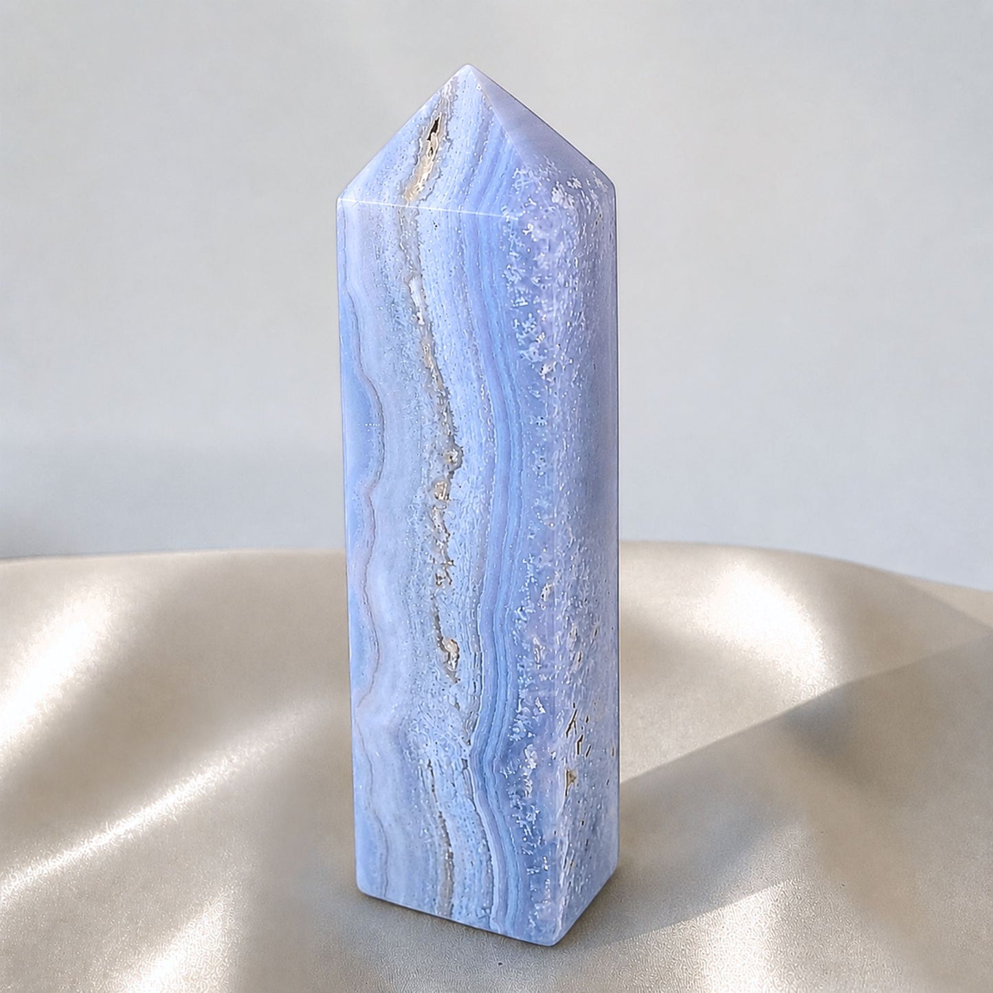 Natural Blue Lace Agate polished crystal generator point for premium home decor and mineral collections, shipped from Melbourne Australia.