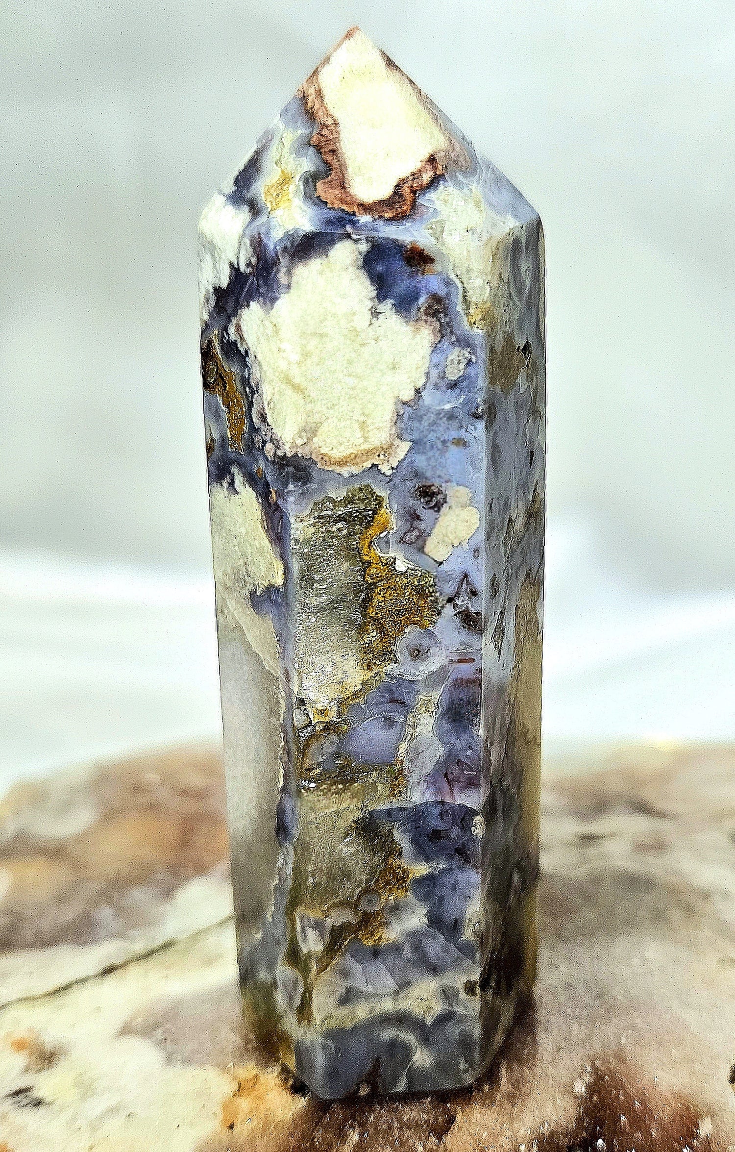 Crystal towers (points) are ideal for manifesting through amplifying intentions and directing energy upwards to enhance mental clarity and spiritual connection, particularly during meditation.