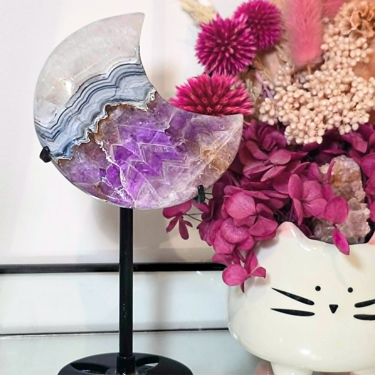 Mexican Crazy Lace Agate and Amethyst crescent moon crystal on custom stand with banded agate and purple quartz centre