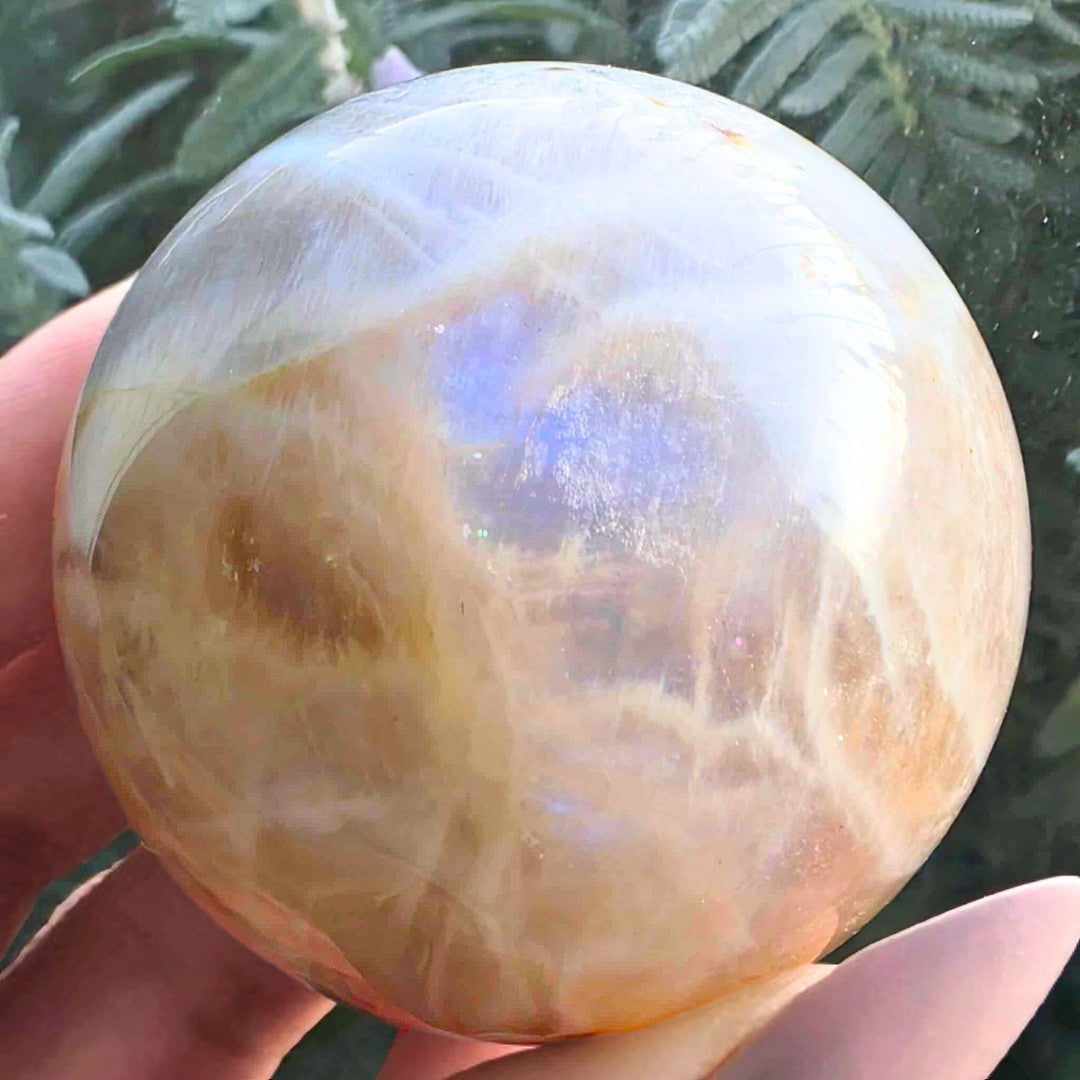 White Moonstone with Rainbow Sunstone Sphere - includes stand