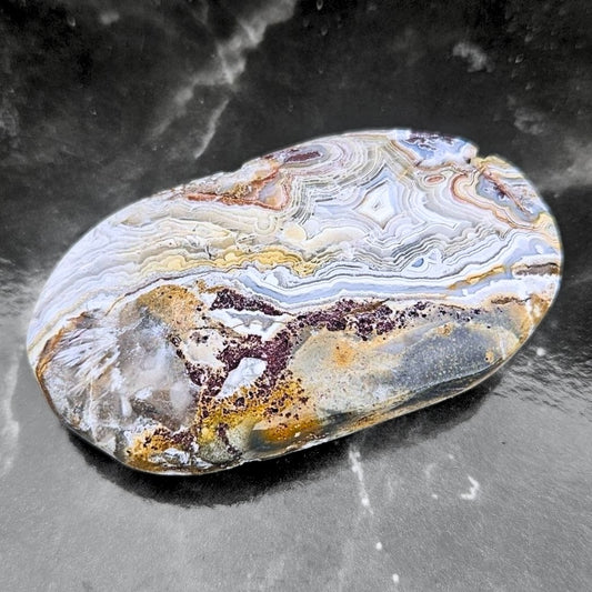 Crazy Lace Agate Palm Stone
