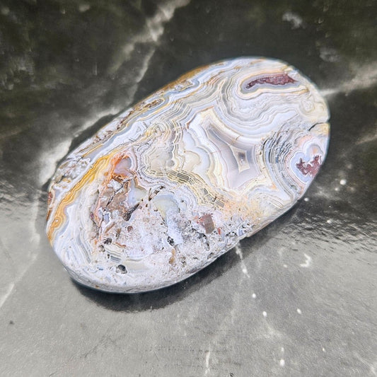 Crazy Lace Agate Palm Stone