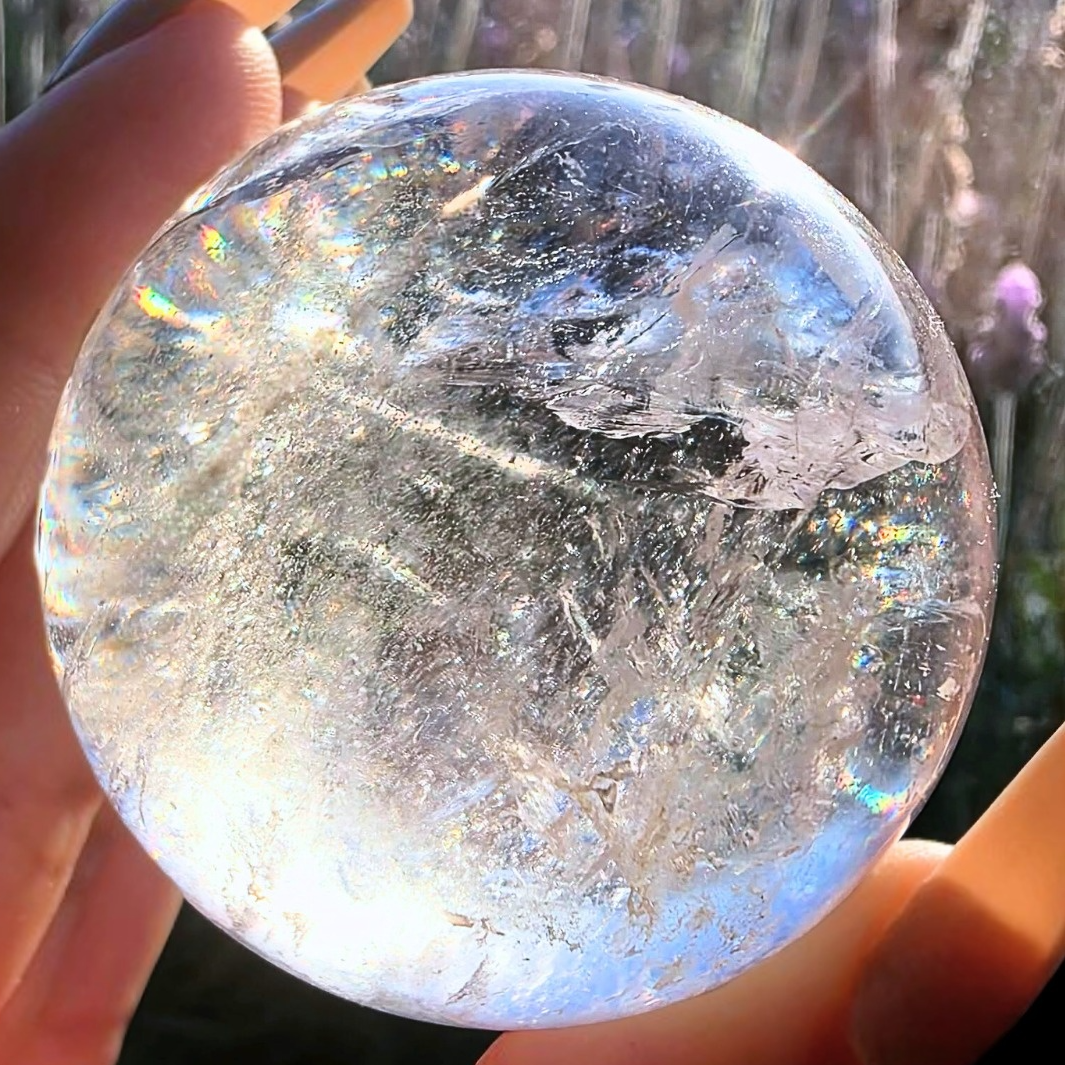 High Grade Clear Quartz Sphere with Rainbows & Phantoms - 213g