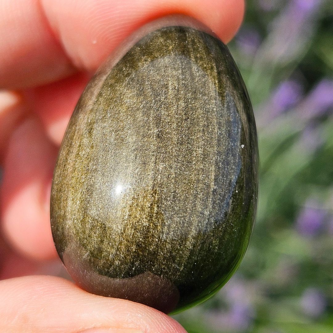 Gold Sheen Obsidian Egg Carving - stand included
