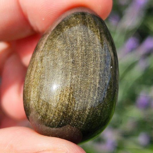 Gold Sheen Obsidian Egg Carving - stand included