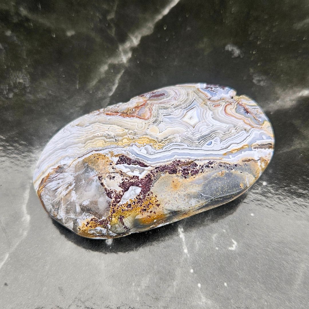 Crazy Lace Agate Palm Stone