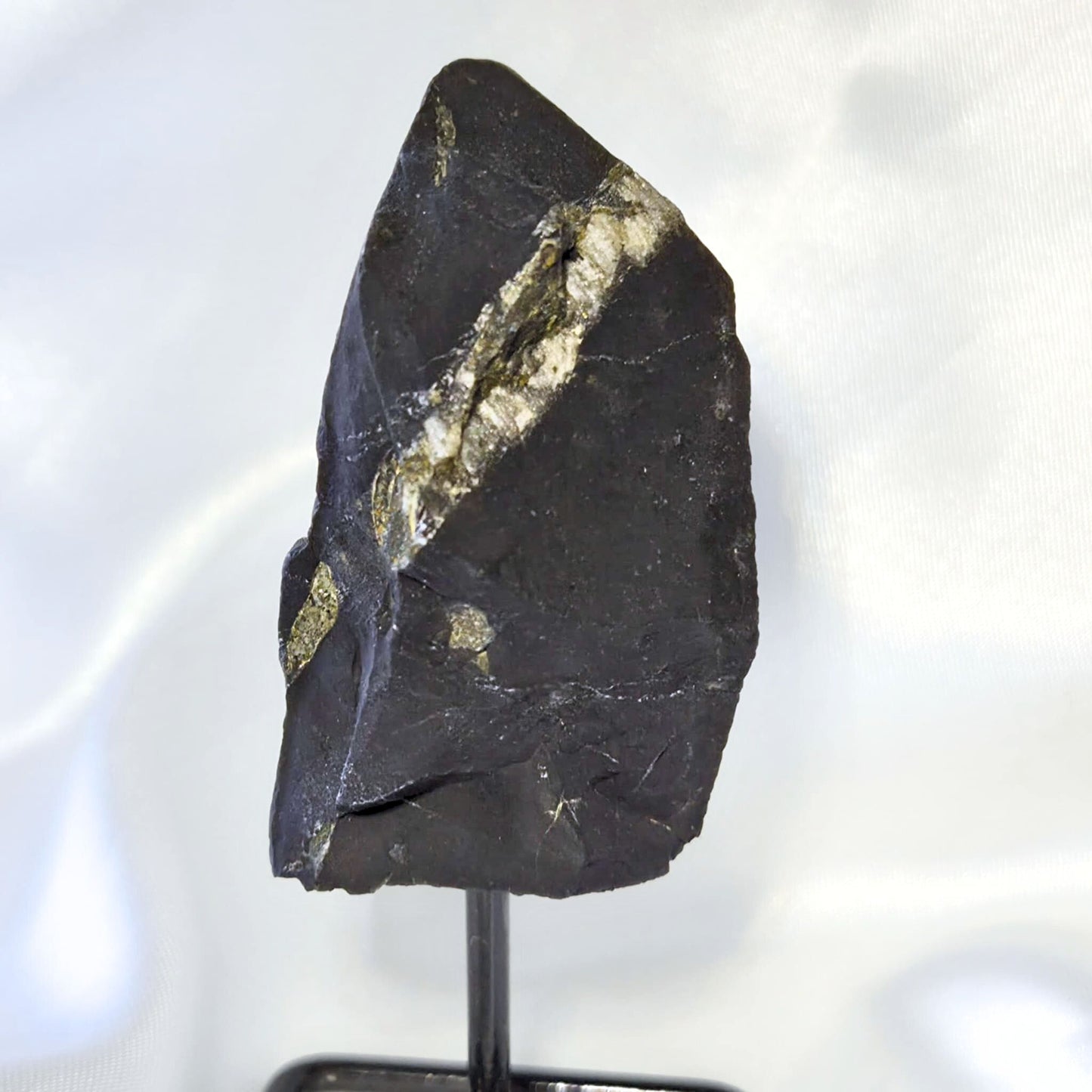 Shungite with Pyrite on Metal Stand