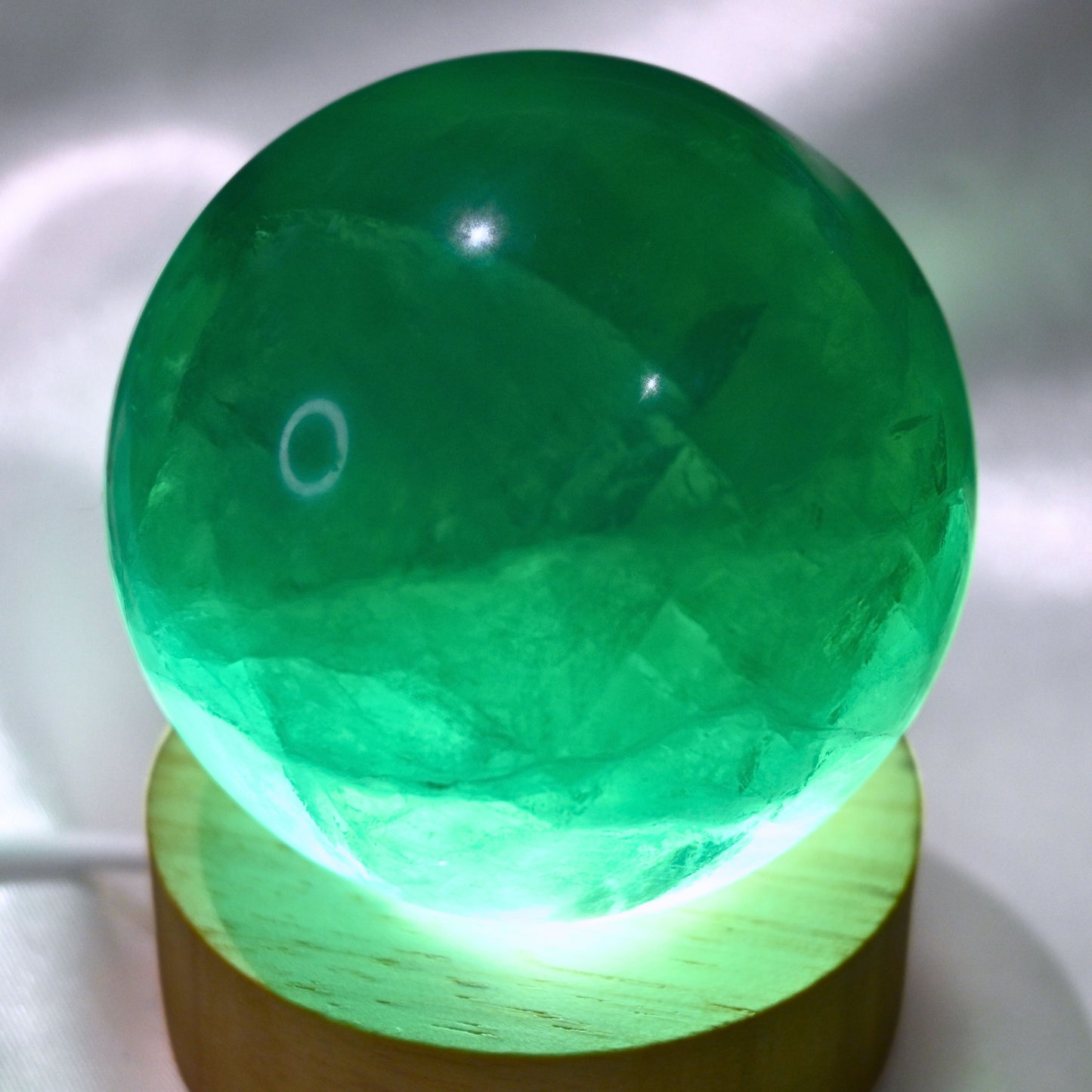 High Grade Green Fluorite Sphere with Rainbows - 405g