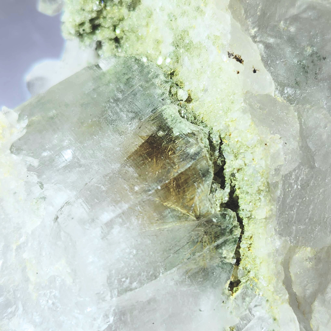 Chlorite in Quartz with Rutile Inclusions