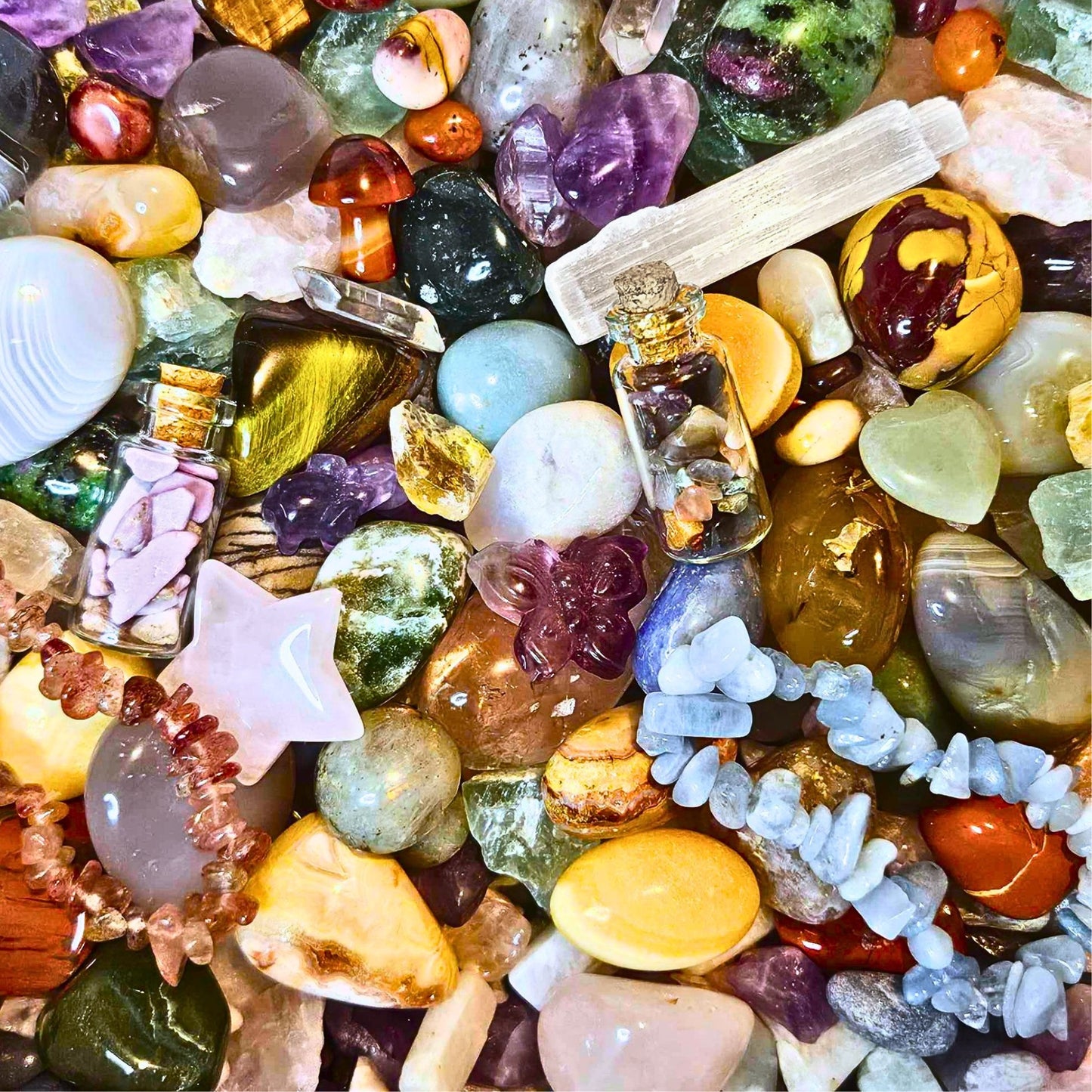 Nature Crystal Confetti Scoop featuring green crystal tumbles, raw minerals, crystal chips and miniature carvings.