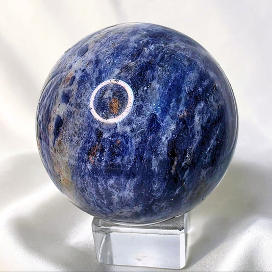 polished sodalite sphere with magnetite inclusions Australia