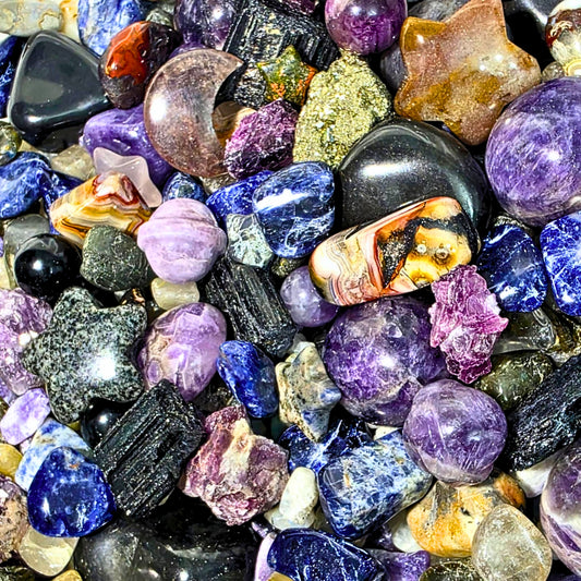 Galaxy Crystal Confetti Scoop containing mixed crystal tumbles, crystal chips, raw minerals and mini carvings