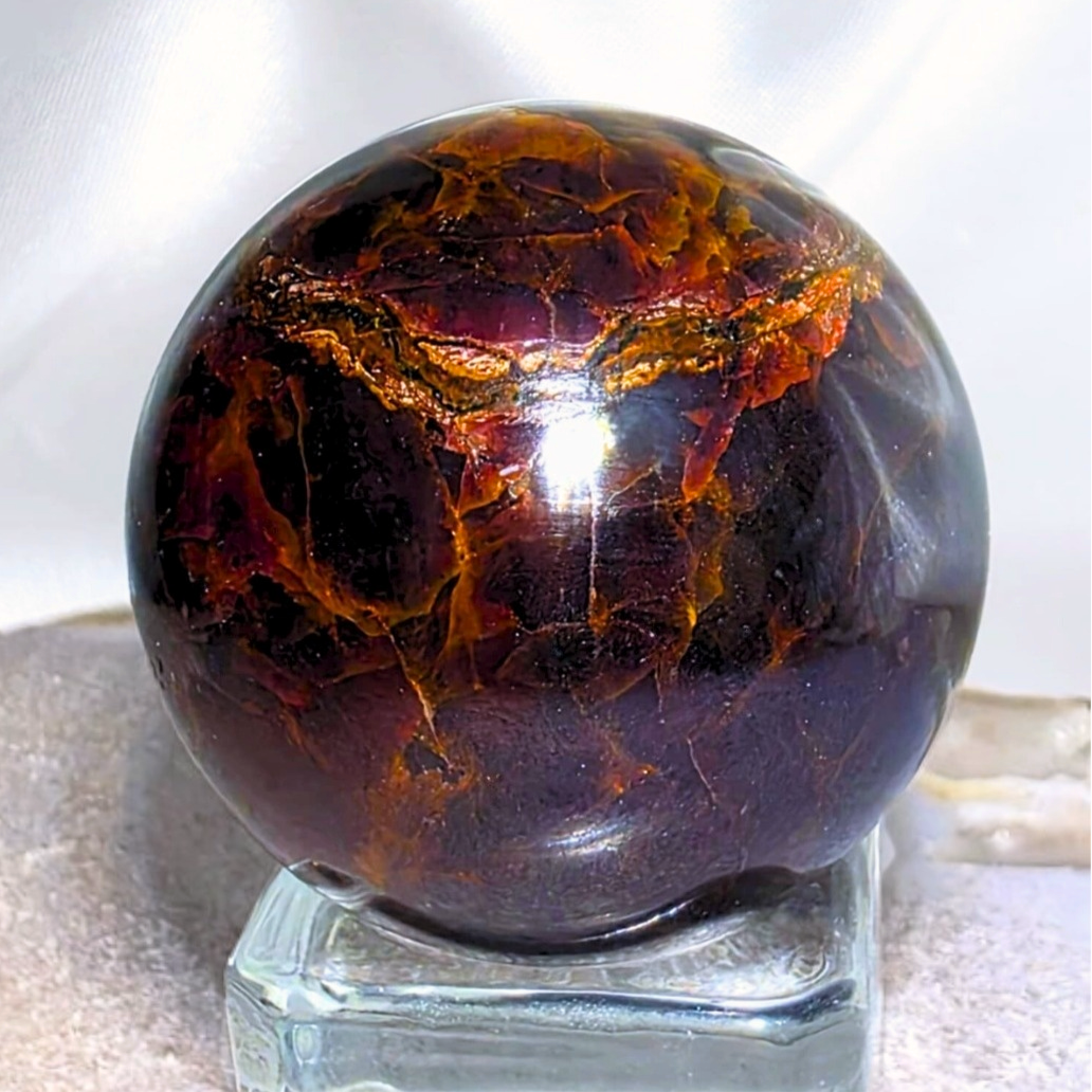 Extra Grade Garnet Sphere with Blue Star Asterisms