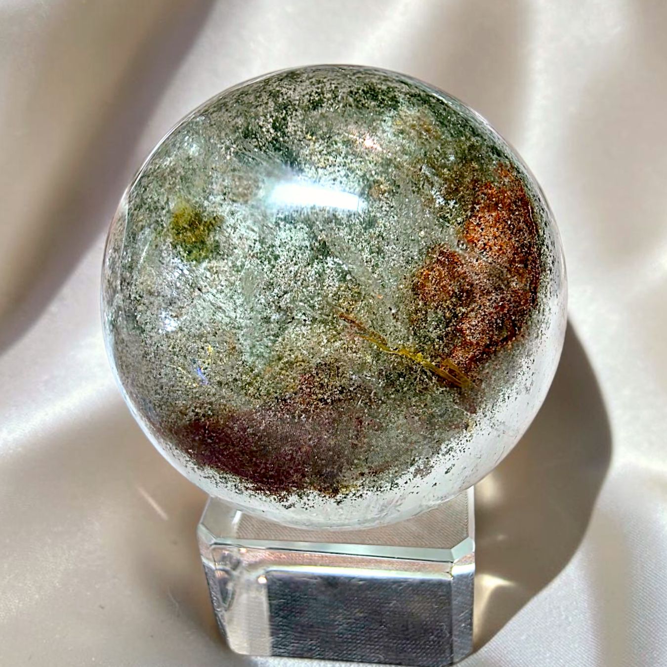 Garden Quartz crystal sphere with green and earthy natural mineral inclusions