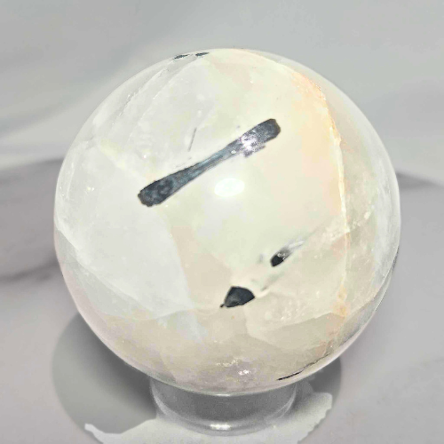 Tourmalinated Quartz Sphere with Golden Healer Inclusions